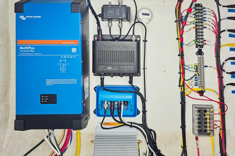 Slide: The Image of Electrical system setup in a 2018 Maine Cat 38 LS, featuring Victron Energy MultiPlus. - 83