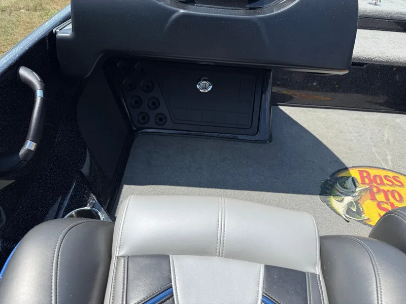 Slide: The Image of 2019 Nitro Z21 boat interior with Bass Pro Shops logo on carpet. - 16