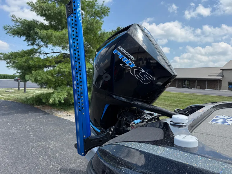 Slide: The Image of 2019 Nitro Z21 boat with Mercury Pro XS engine, parked outdoors. - 20