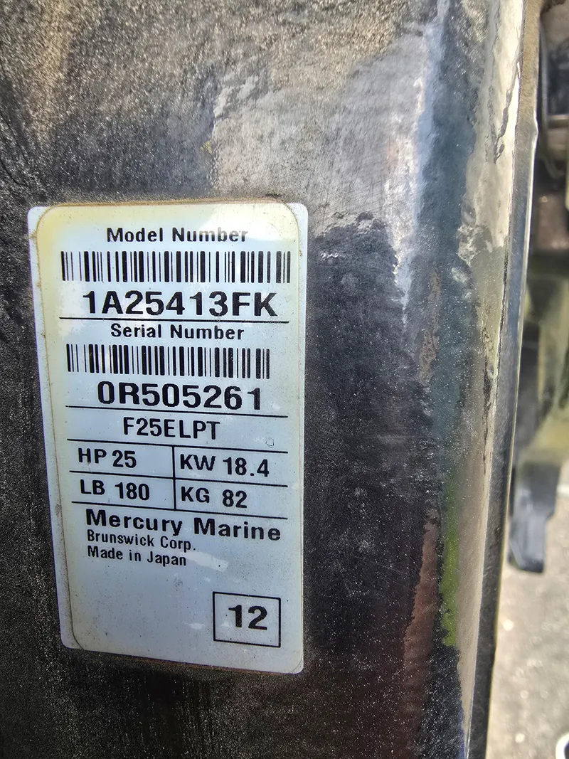 Slide: The Image of Label on Mercury Marine engine, model F25ELPT, 25 HP, made in Japan, 2012. - 5