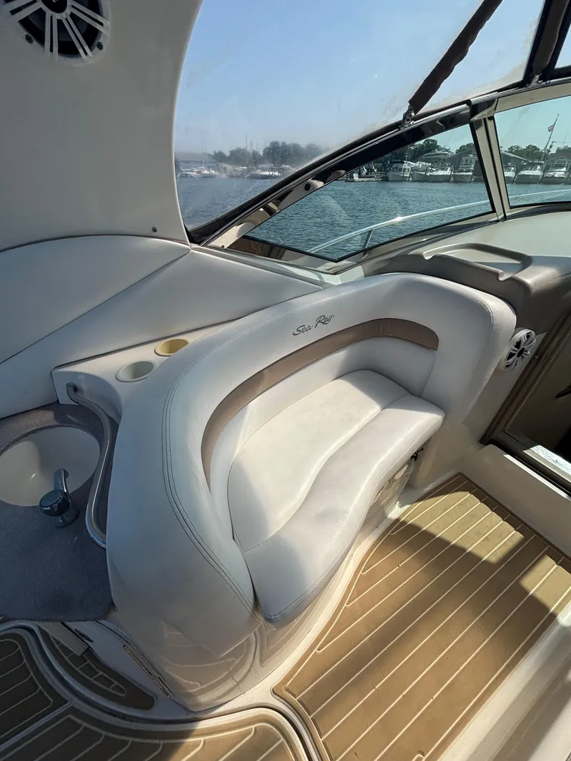 Slide: The Image of 2004 Sea Ray 320 Sundancer interior with plush seating and elegant design. - 24