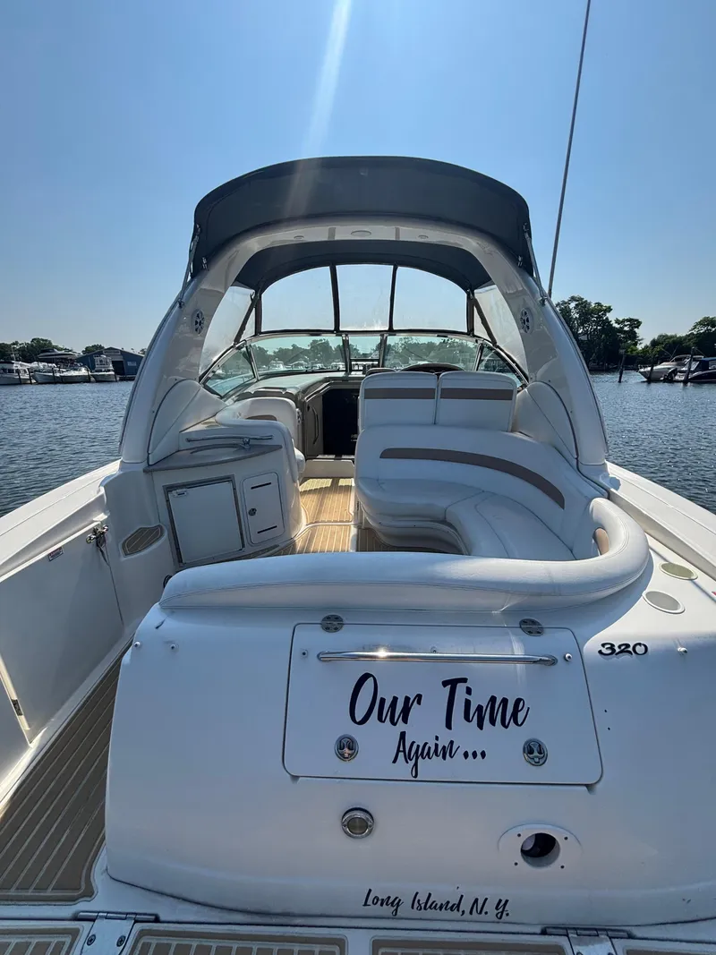Slide: The Image of 2004 Sea Ray 320 Sundancer boat docked in Long Island, NY, with spacious seating. - 25