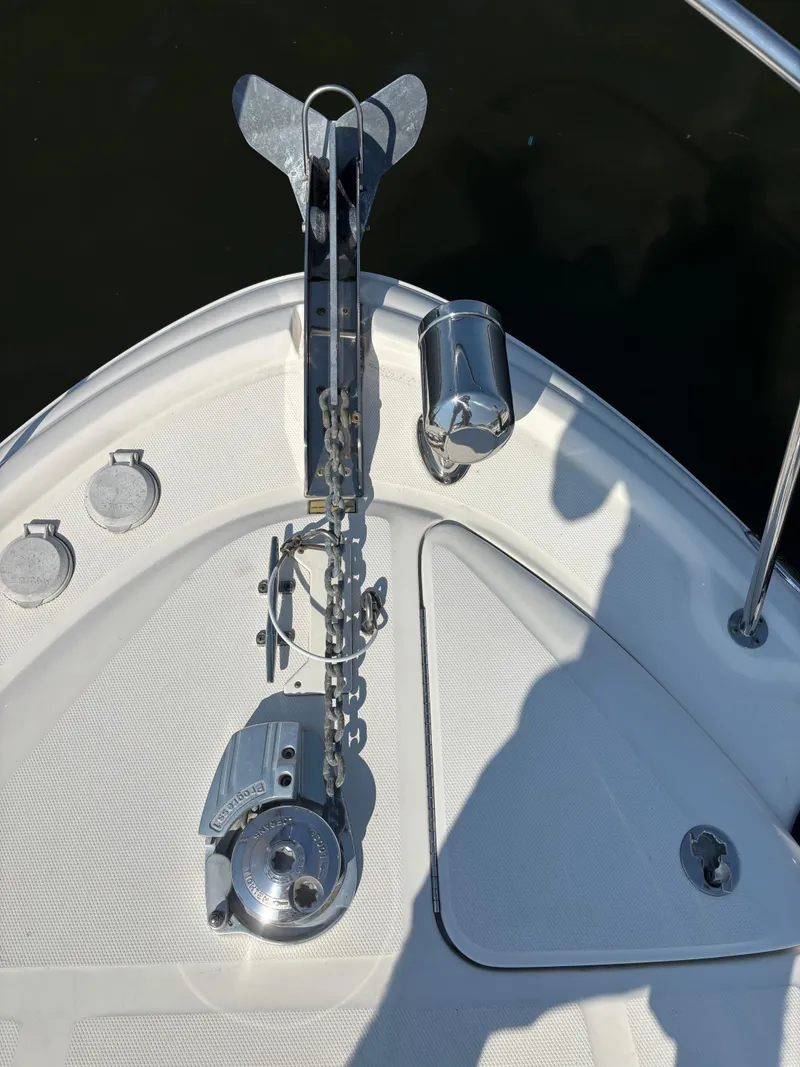 Slide: The Image of Bow of 2004 Sea Ray 320 Sundancer with anchor and winch system. - 41