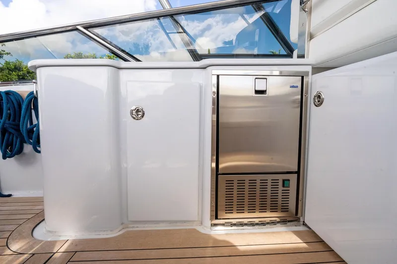 Slide: The Image of Luxury Itama 46 yacht deck with stainless steel fridge, 1995 model. - 17