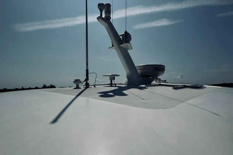 Slide: The Image of Rooftop view of 2007 Sabreline 34 Express boat with radar and antennas. - 100