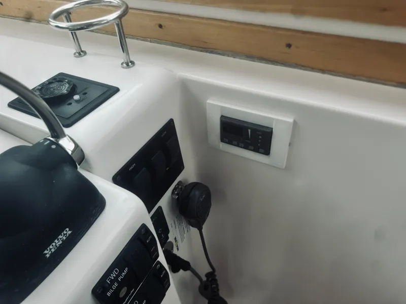 Slide: The Image of Control panel of a 2007 Sabreline 34 Express boat with Volvo Penta throttle. - 30