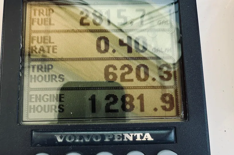 Slide: The Image of Volvo Penta display showing fuel and engine data for 2007 Sabreline 34 Express. - 36