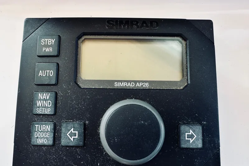 Slide: The Image of Simrad AP26 autopilot control panel on 2007 Sabreline 34 Express boat. - 37
