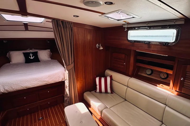 Slide: The Image of Luxurious interior of 2007 Sabreline 34 Express yacht with cozy bed and seating area. - 52