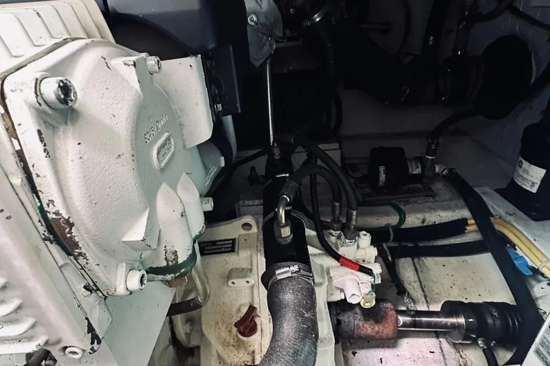 Slide: The Image of Engine compartment of a 2007 Sabreline 34 Express boat, showcasing mechanical components. - 74