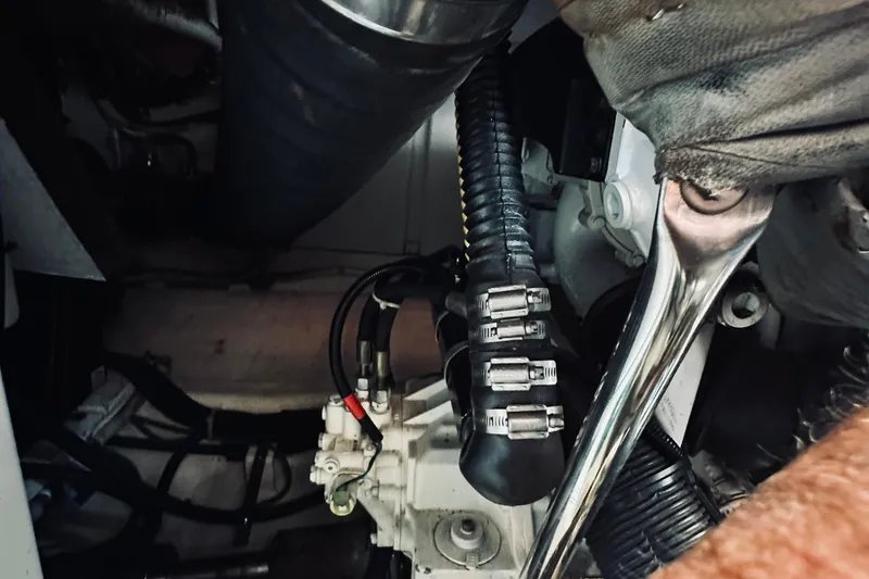 Slide: The Image of Engine compartment of 2007 Sabreline 34 Express boat, showing mechanical components. - 82