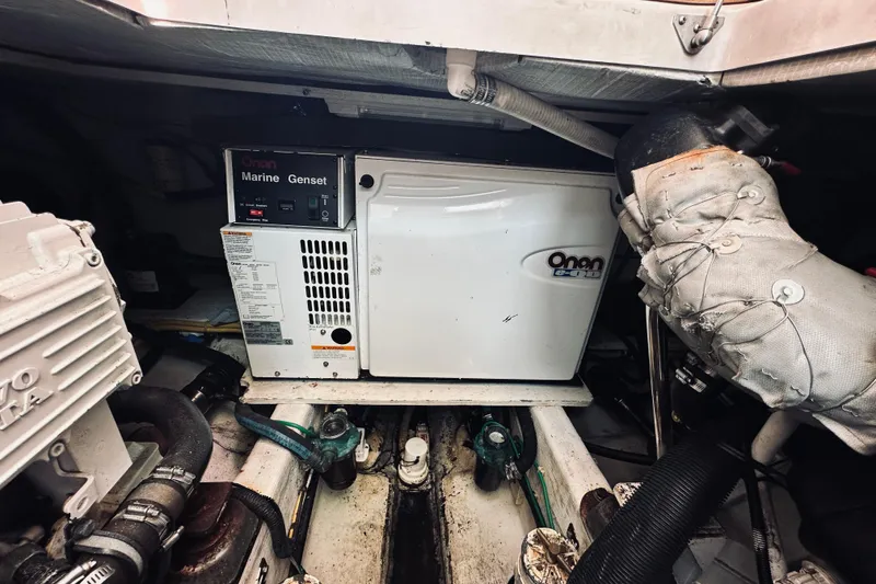 Slide: The Image of Engine room of 2007 Sabreline 34 Express with Onan marine generator. - 83