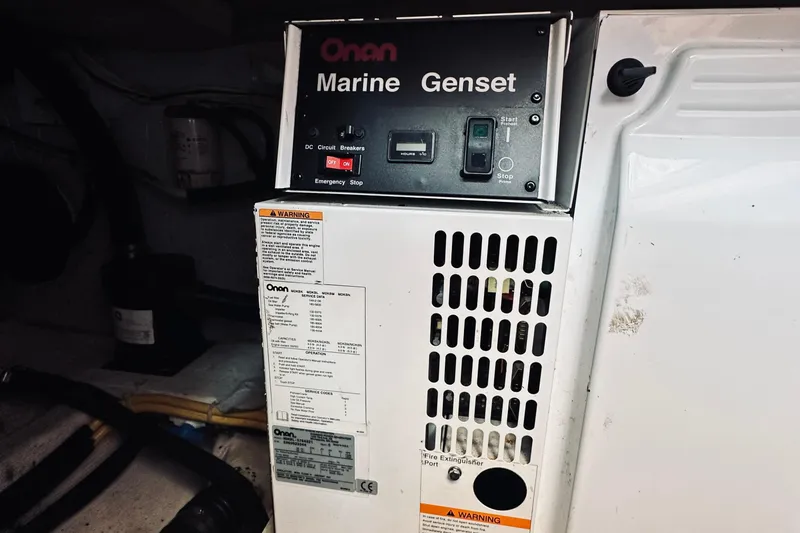 Slide: The Image of Onan Marine Genset in 2007 Sabreline 34 Express boat engine room. - 84