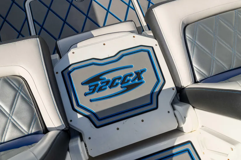 Slide: The Image of 2020 Sunsation 32 CCX boat interior with stylish seating and ocean view. - 12