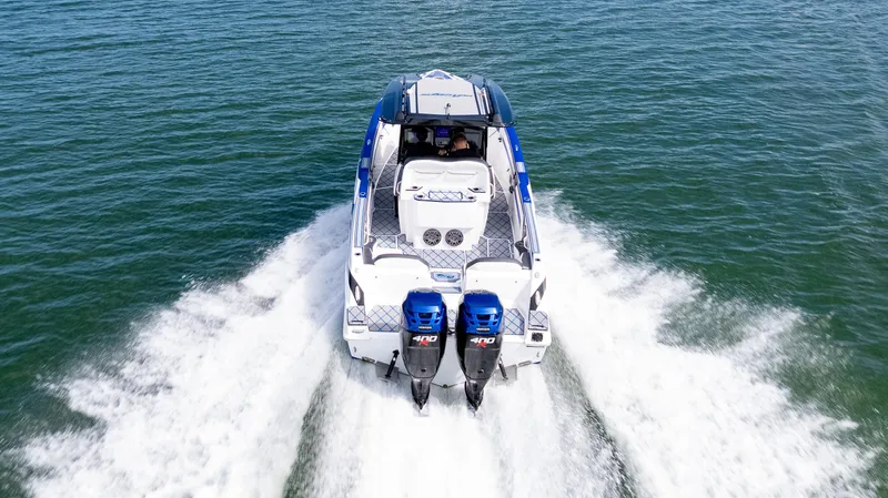 Slide: The Image of 2020 Sunsation 32 CCX boat interior with blue and gray seating design. - 13