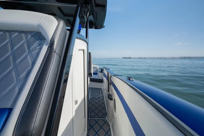 Slide: The Image of 2020 Sunsation 32 CCX boat with twin Racing 400 outboard engines on calm water. - 15