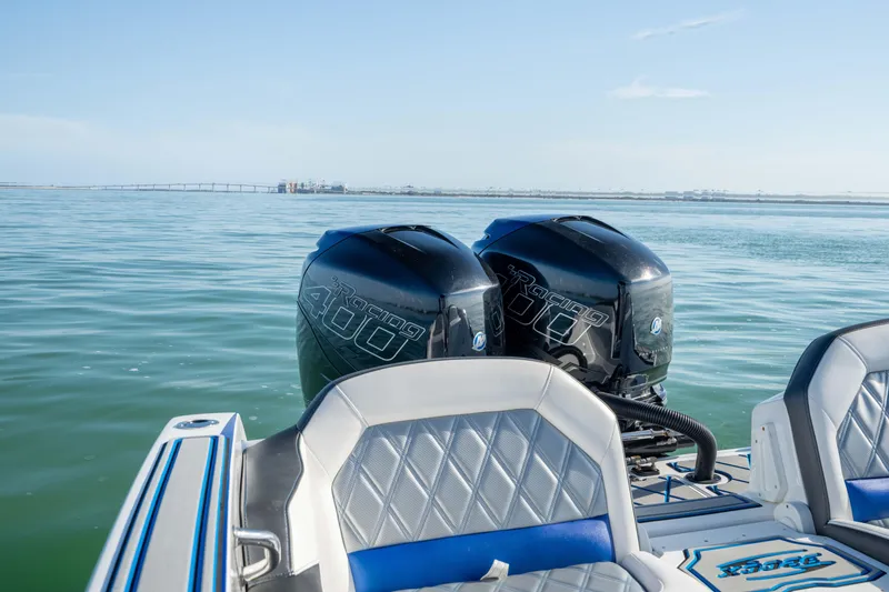 Slide: The Image of 2020 Sunsation 32 CCX boat with twin Mercury Racing 400 engines on calm water. - 23