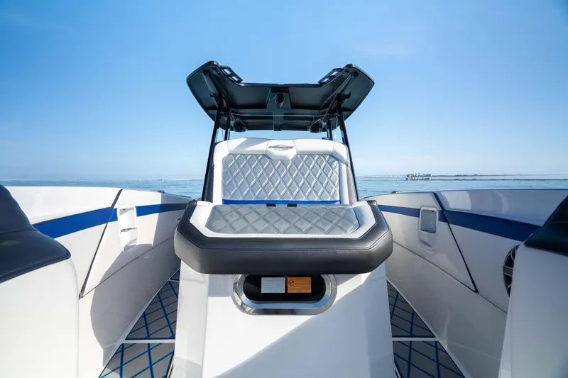 Slide: The Image of 2020 Sunsation 32 CCX boat cockpit with advanced navigation displays and controls. - 3