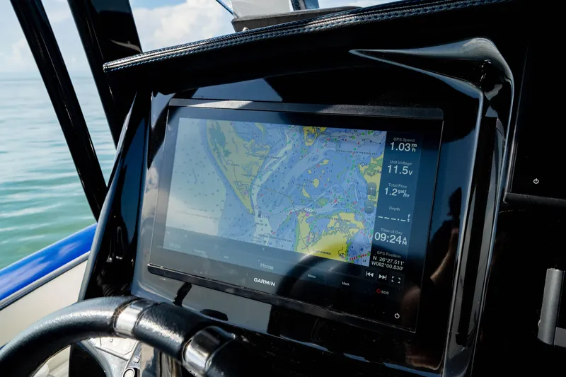 Slide: The Image of Garmin navigation display on 2020 Sunsation 32 CCX boat, showing nautical map and data. - 34