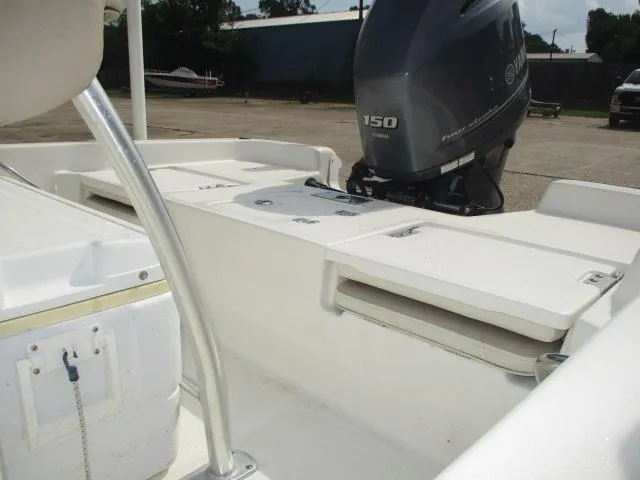 Slide: The Image of 2017 NauticStar 2140 Sport boat with Yamaha 150 engine, rear deck view. - 7