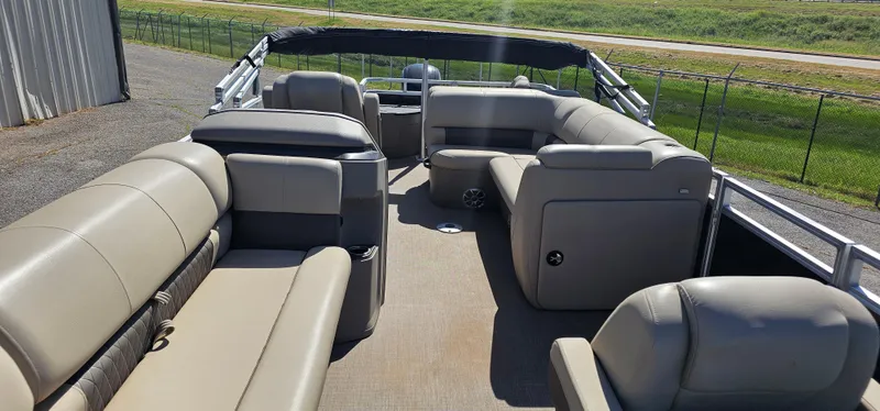 Slide: The Image of 2024 Sun Tracker SportsFish 20 DLX pontoon boat with spacious seating and modern design. - 5