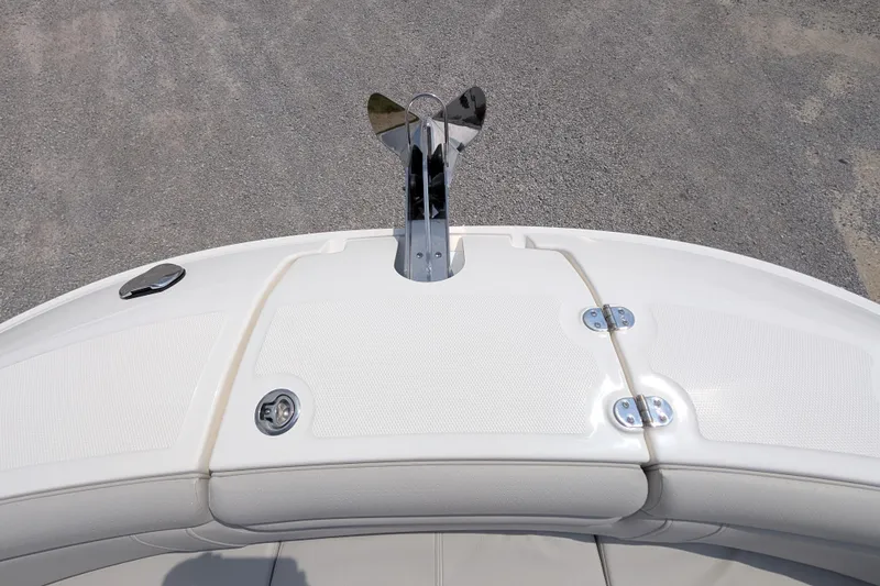 Slide: The Image of 2025 Sea Ray SDX 290 boat bow with anchor and storage compartments. - 11