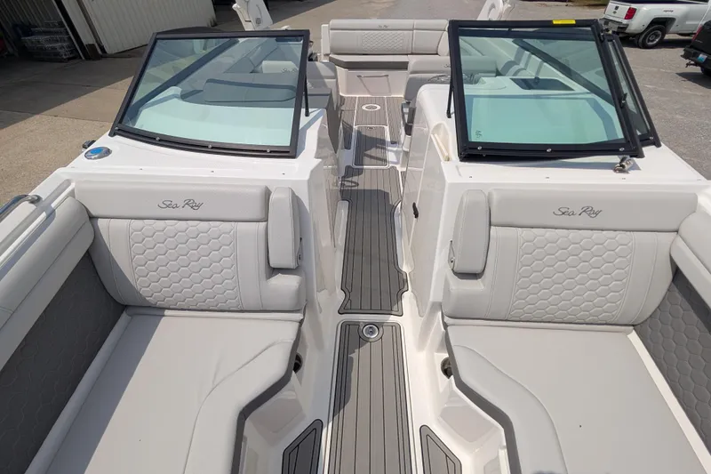 Slide: The Image of 2025 Sea Ray SDX 290 boat interior with luxurious seating and modern design. - 12