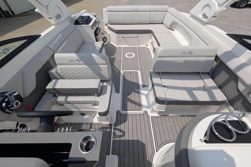 Slide: The Image of 2025 Sea Ray SDX 290 boat interior with luxurious seating and modern design. - 13