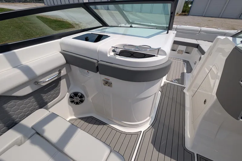 Slide: The Image of 2025 Sea Ray SDX 290 boat interior with sleek seating and modern design. - 20