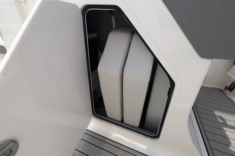Slide: The Image of Storage compartment on 2025 Sea Ray SDX 290 boat, featuring sleek design and modern materials. - 22