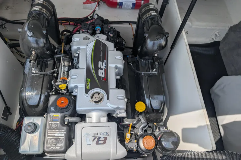 Slide: The Image of Engine compartment of 2025 Sea Ray SDX 290 with 8.2L V8 MerCruiser engine. - 27