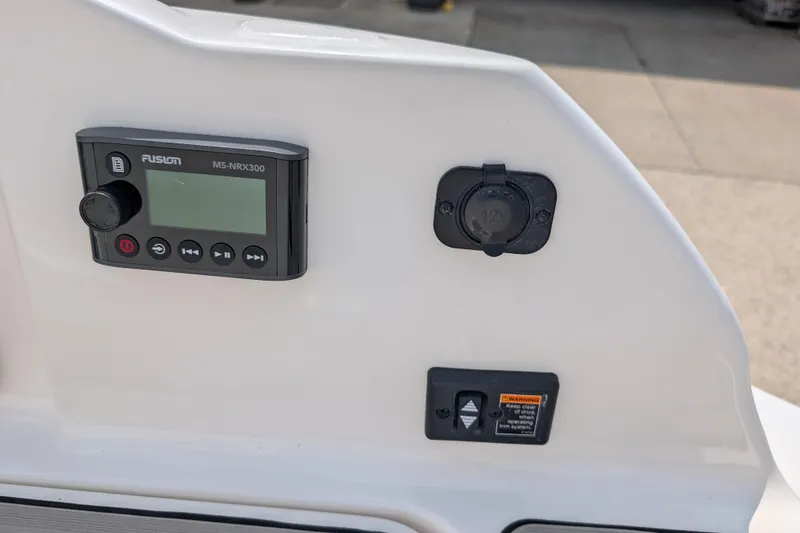 Slide: The Image of Control panel on 2025 Sea Ray SDX 290 boat with Fusion MS-NRX300 stereo system. - 29