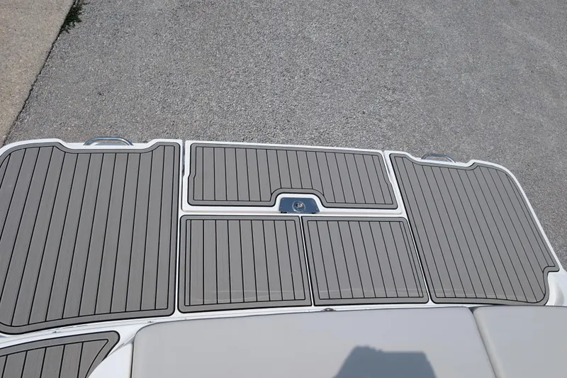 Slide: The Image of 2025 Sea Ray SDX 290 swim platform with sleek, modern design and textured surface. - 31