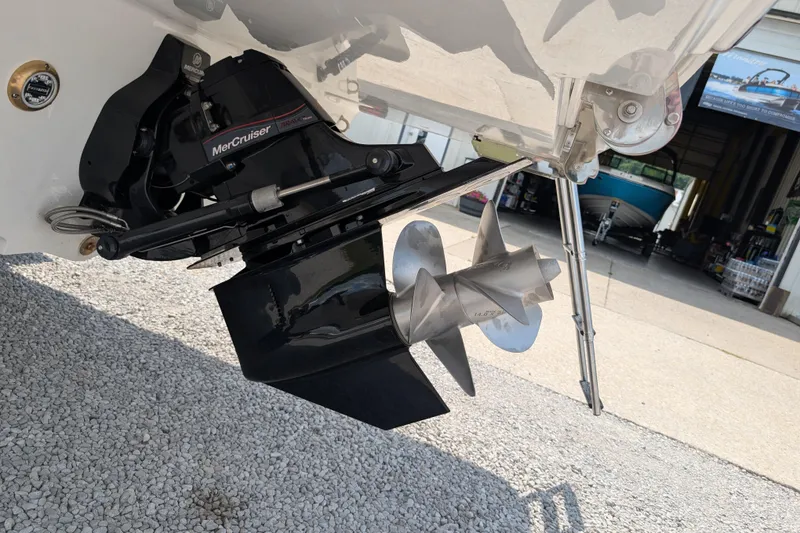 Slide: The Image of Close-up of 2025 Sea Ray SDX 290 MerCruiser engine and propeller system. - 32