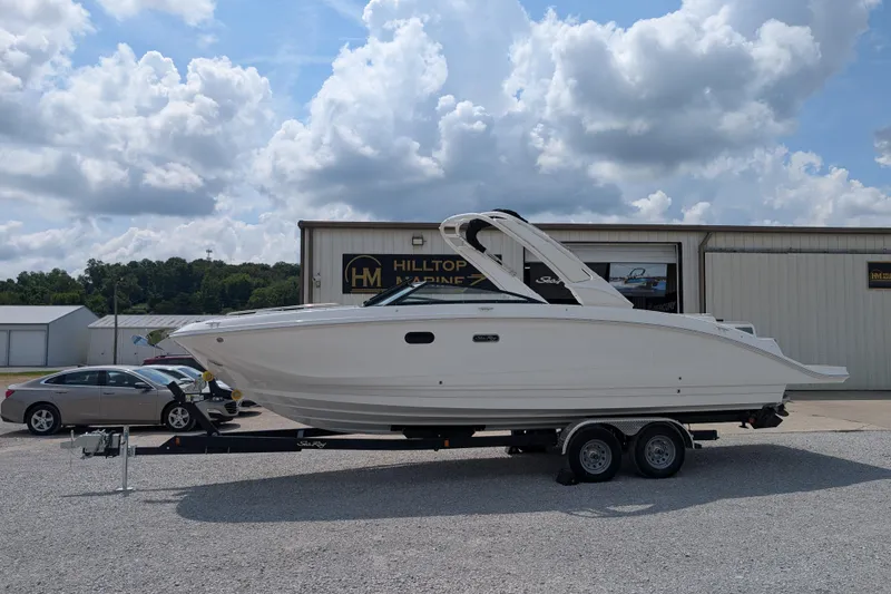 Slide: The Image of 2025 Sea Ray SDX 290 boat on trailer at Hilltop Marine dealership. - 4