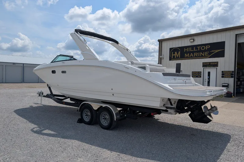 Slide: The Image of 2025 Sea Ray SDX 290 boat on trailer at Hilltop Marine dealership. - 5