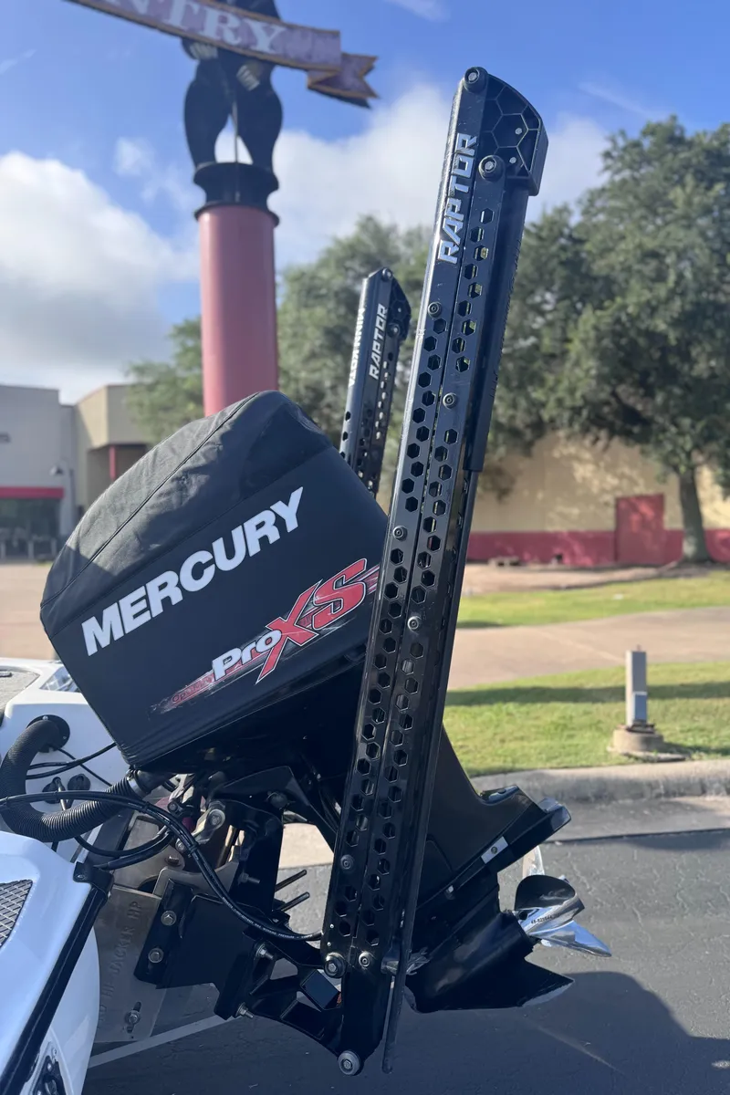 Slide: The Image of 2007 Triton Tr-20X HP DC boat with Mercury Pro XS engine and Raptor anchors. - 2