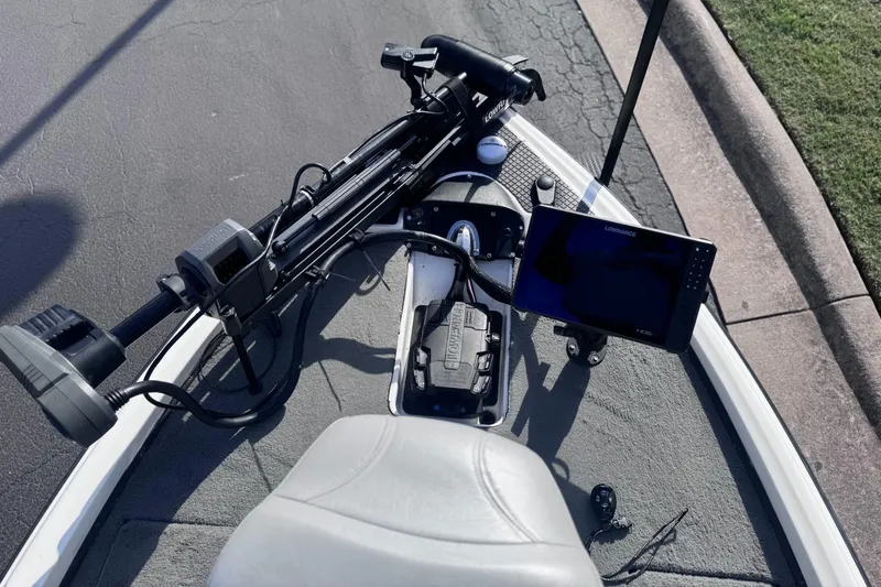 Slide: The Image of 2007 Triton Tr-20X HP DC boat dashboard with Lowrance electronics and trolling motor. - 5