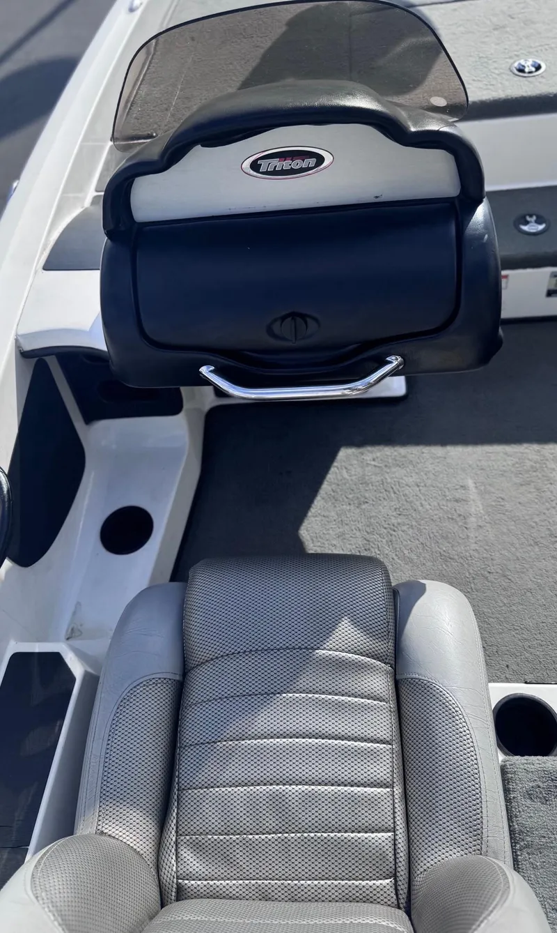 Slide: The Image of 2007 Triton Tr-20X HP DC boat interior with steering console and seat. - 8