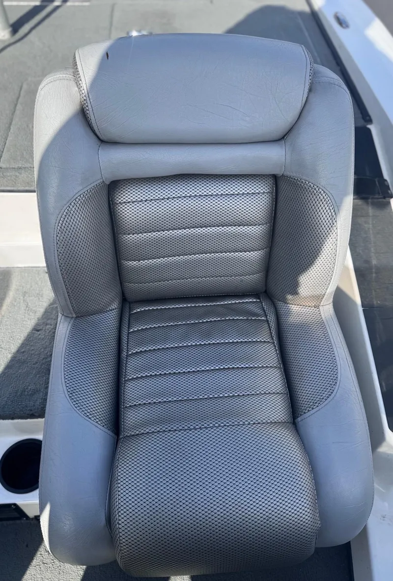 Slide: The Image of Gray leather seat of a 2007 Triton Tr-20X HP DC boat. - 9