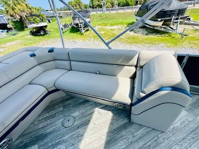 Slide: The Image of Luxurious seating on 2018 South Bay 525CPTR pontoon boat, featuring plush upholstery and spacious layout. - 14