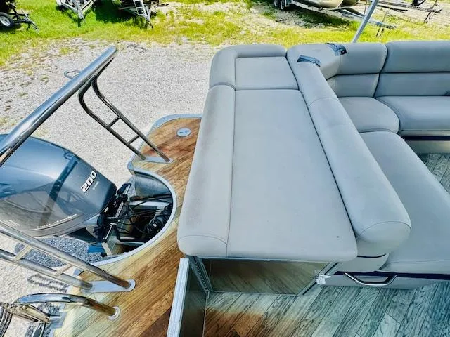 Slide: The Image of 2018 South Bay 525CPTR pontoon boat with spacious seating and powerful outboard motor. - 19