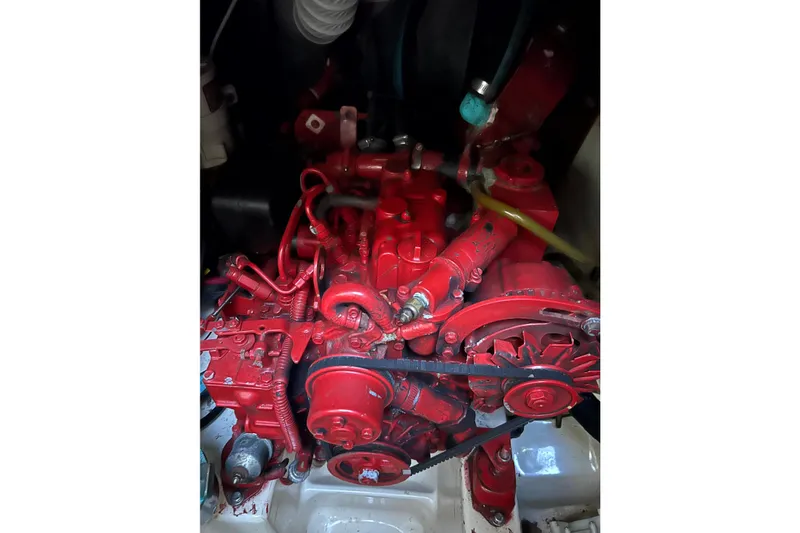 Slide: The Image of Red engine of a 1989 Sabre 30 MKIII sailboat, detailed view. - 17