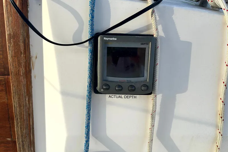 Slide: The Image of Depth gauge on 1989 Sabre 30 MKIII sailboat, surrounded by ropes. - 8