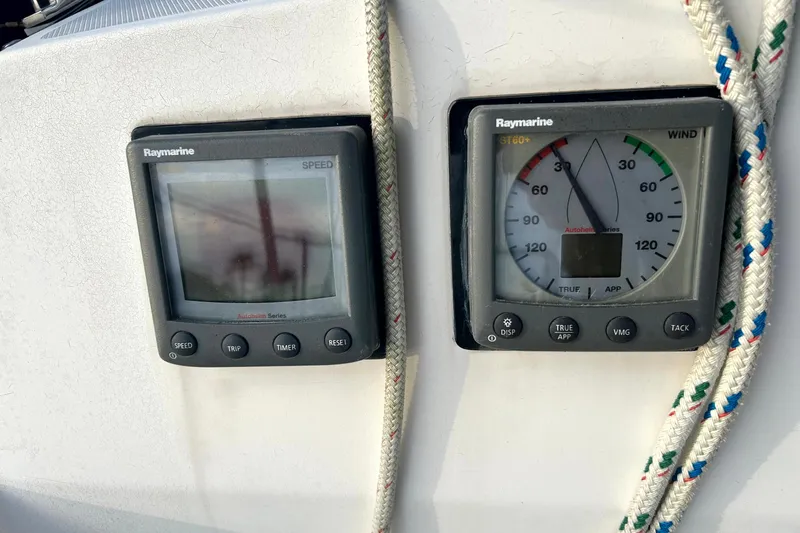 Slide: The Image of Raymarine instruments on 1989 Sabre 30 MKIII sailboat, displaying speed and wind data. - 9