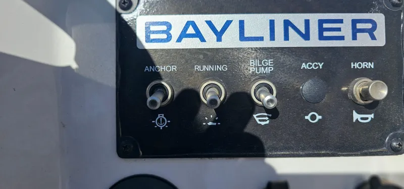 Slide: The Image of Control panel of 2024 Bayliner Element M17 boat with switches for anchor, running, bilge pump, and horn. - 12