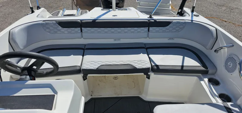 Slide: The Image of 2024 Bayliner Element M17 boat interior with seating and steering wheel. - 6