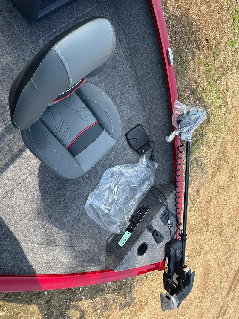 Slide: The Image of 2025 Tracker Pro Guide V-175 Combo boat interior with seat and trolling motor. - 12