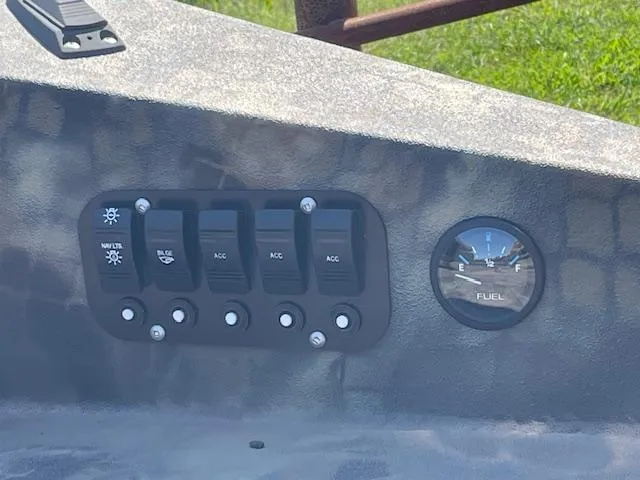Slide: The Image of Control panel of 2025 Excel Eclipse boat with switches and fuel gauge. - 11