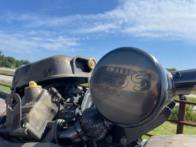 Slide: The Image of Close-up of 2025 Excel Eclipse motorcycle engine with BPS branding under a clear blue sky. - 3